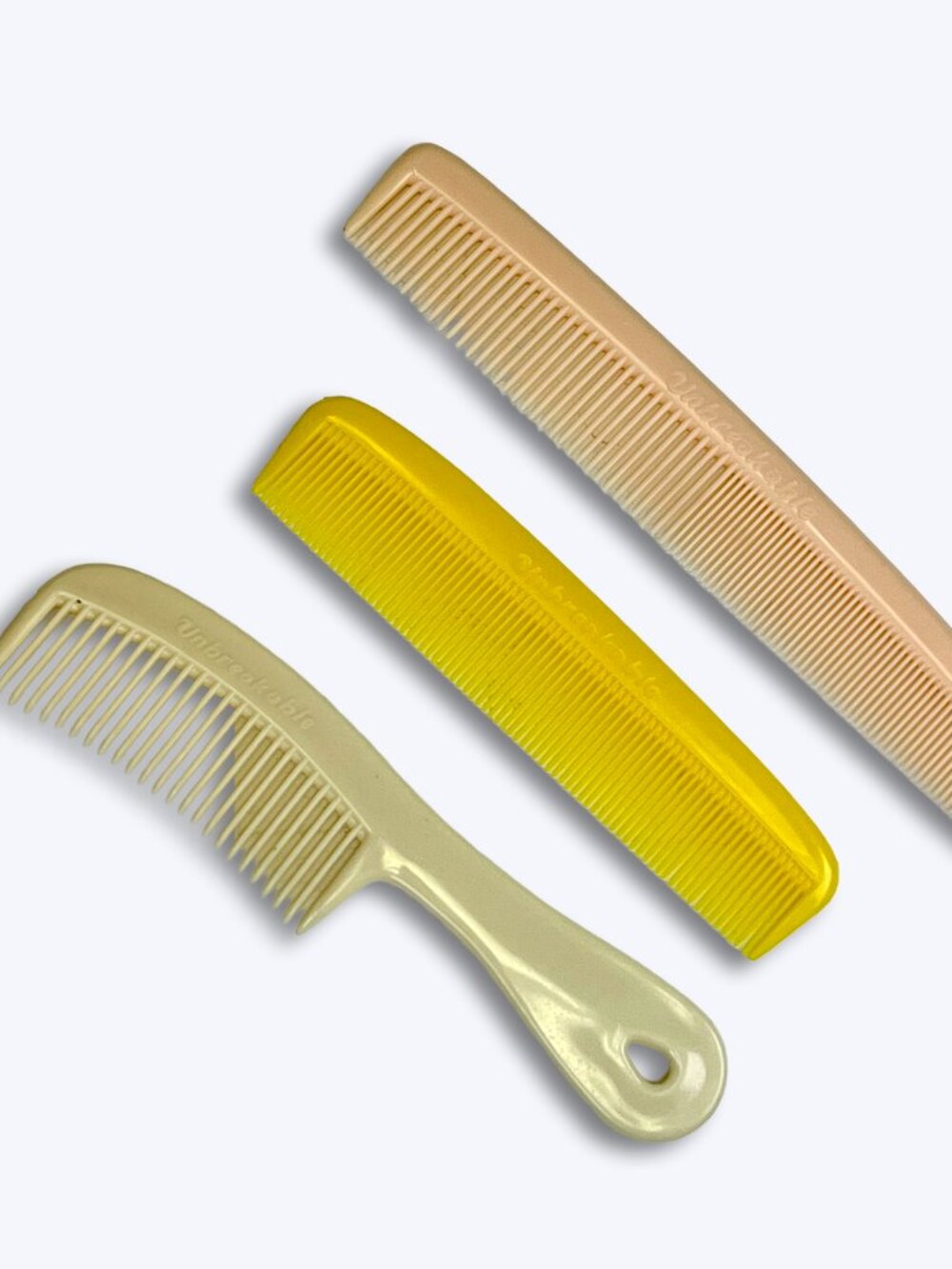 Vtg Unbreakable Comb Set 3pc Peach Yellow White Retro Pocket Dresser USA Kitsch